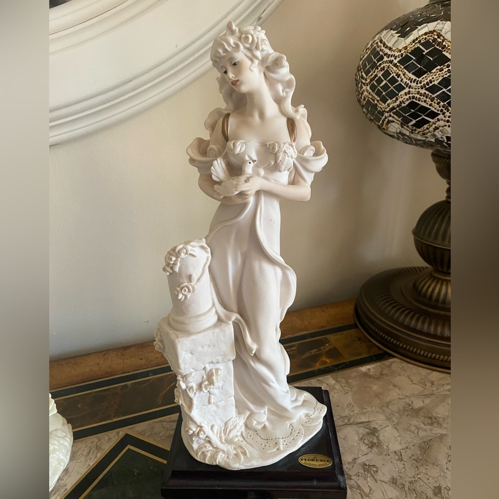 Giuseppe Armani , Lady with the Doves. Missing dove on pedestal.